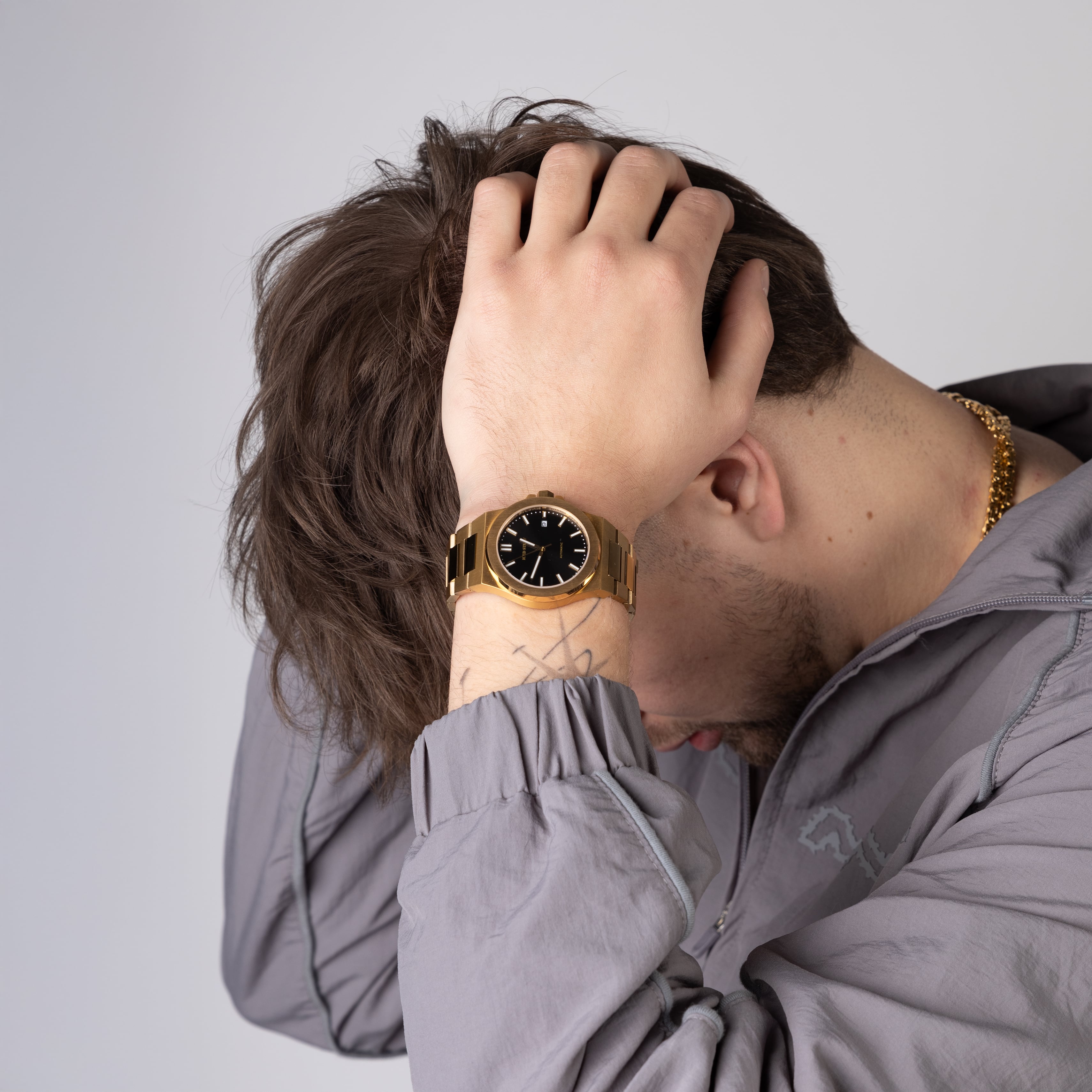 Reloj automático Alpha Champ de 40 mm dorado